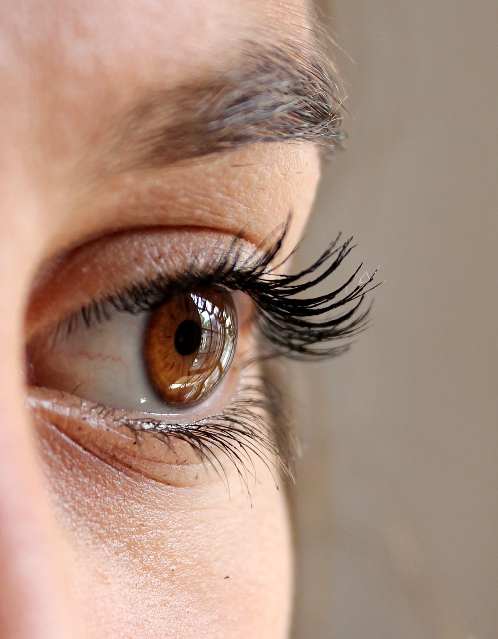 A side view of a women's brown eye